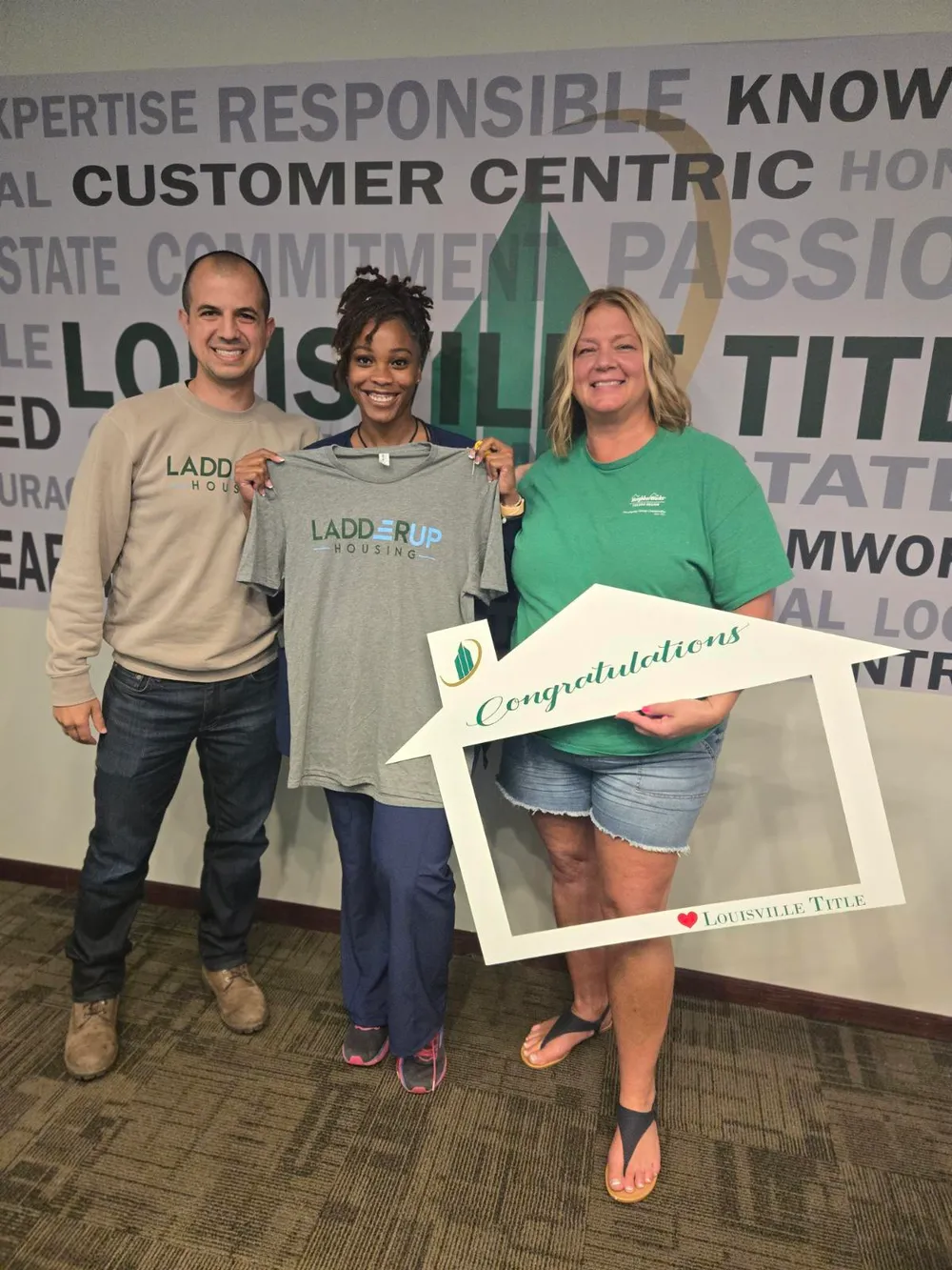 LadderUp Housing homeowner Jasmine signs closing documents on her new home in Toledo, Ohio