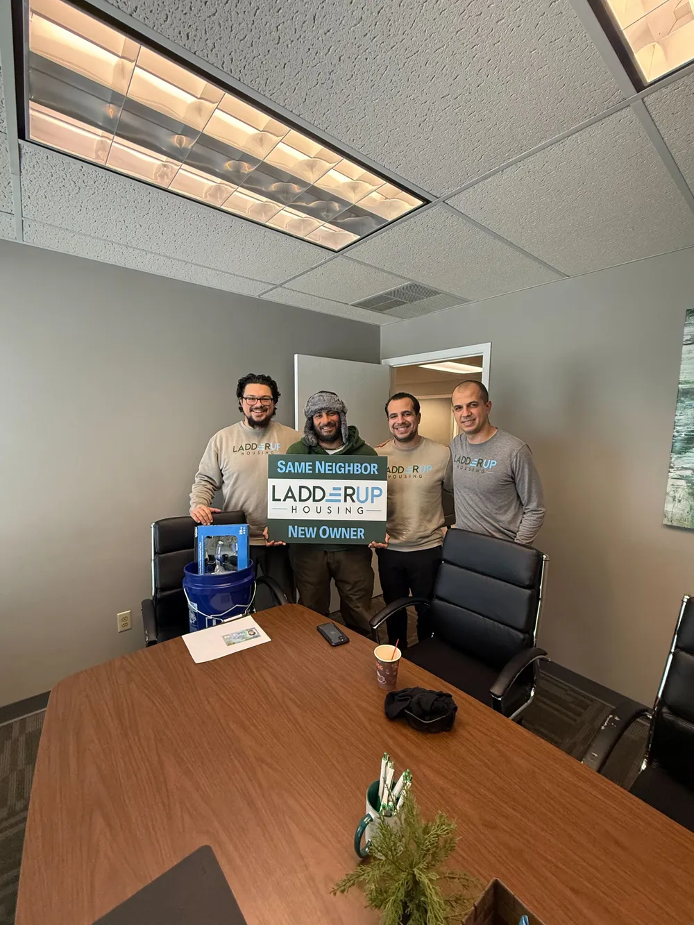 Nate celebrates homeownership milestone with LadderUp Housing coaching team in Toledo, Ohio